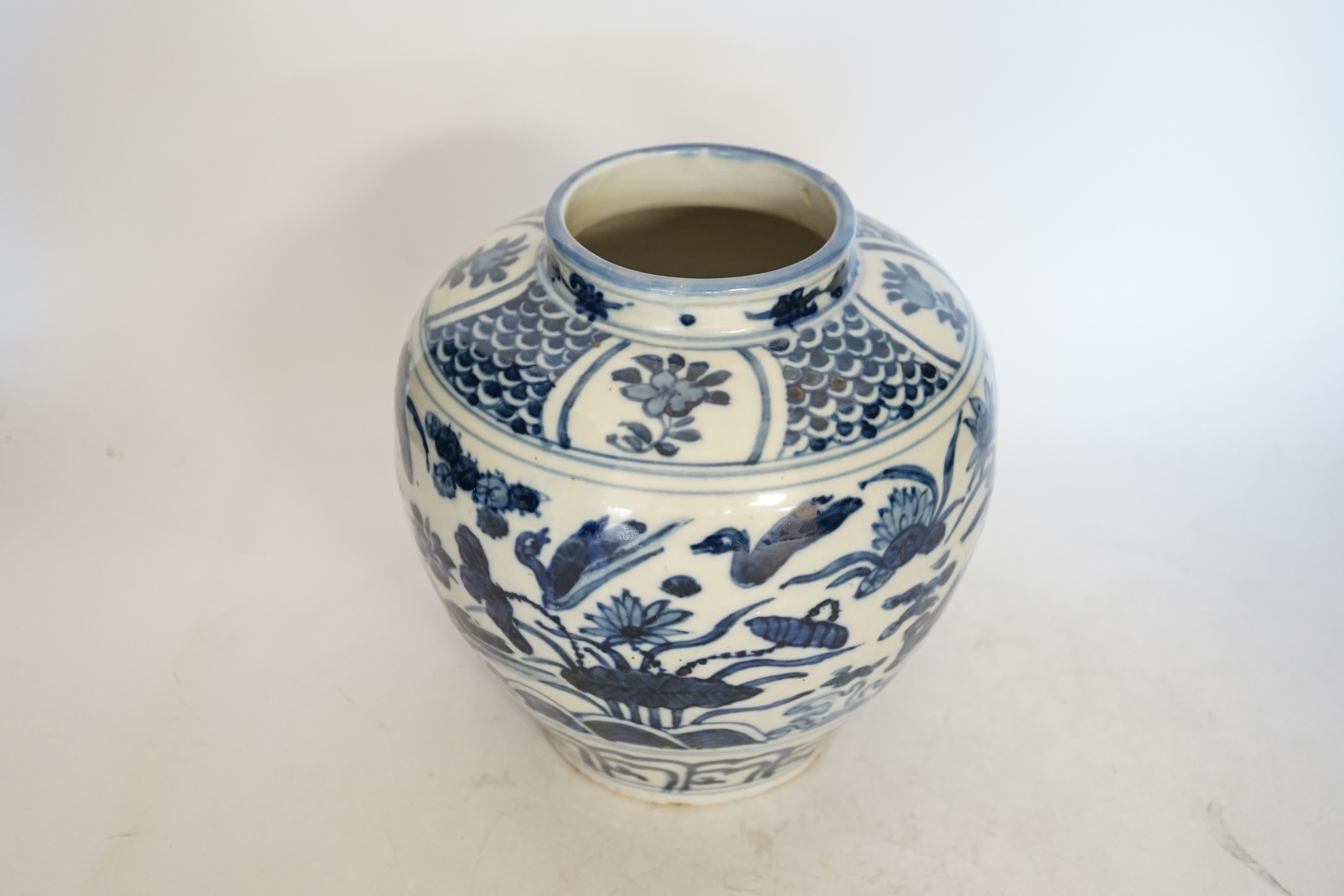 A Chinese blue and white ovoid jar, 18cm high. Condition - good